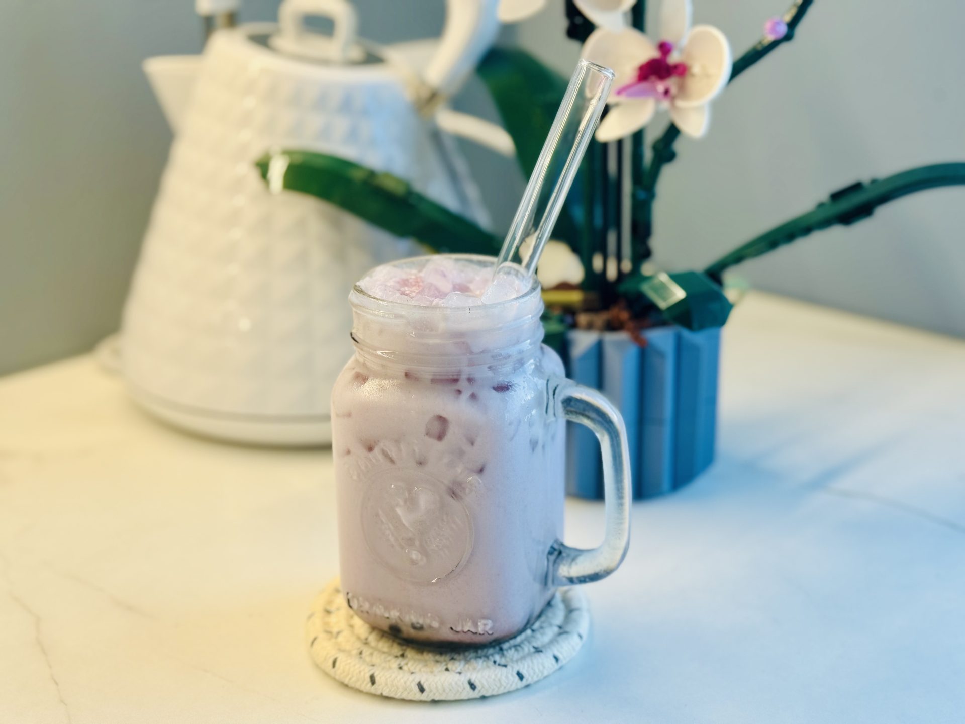 Taro Milk Tea with Boba and straw